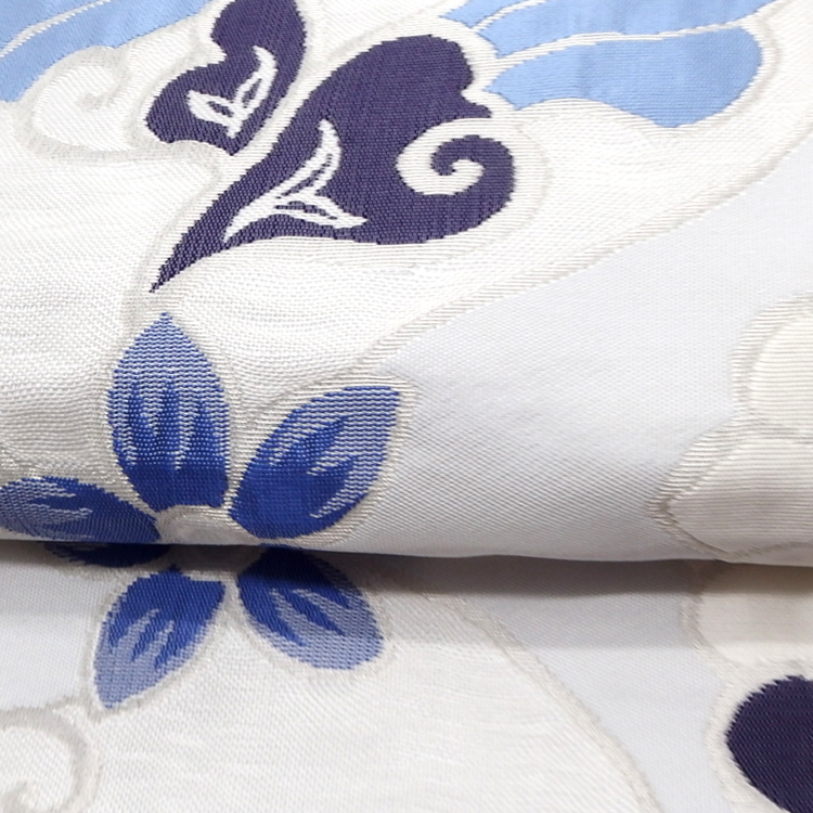 洛風林 「マグノリアの花」 膨れ織 九寸名古屋帯 月白色（水色がかった極薄いグレー）